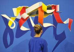 170911-an-employee-views-whispering-wall-ii-by-burhan-dogancay-at-sothebys-in