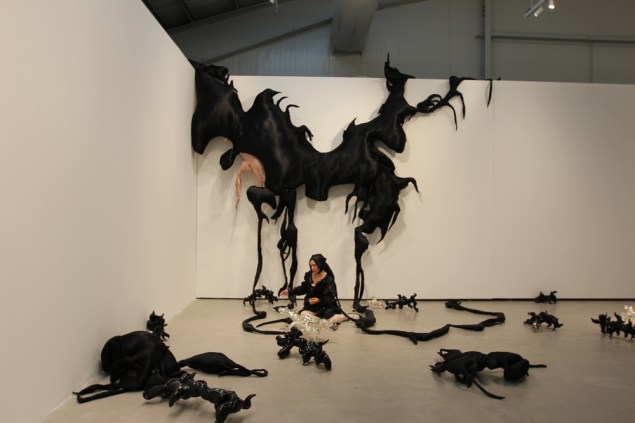 [Marya Kazoun, "Time After Self-Portrait II," performance at Beirut Exhibition Center (2012). Image copyright the artist.]